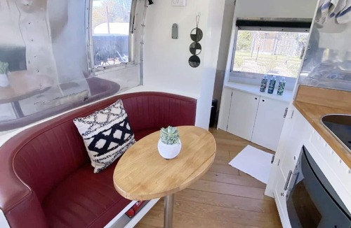 Gumley House | Silverbird Glamping Airstream Caravan and private deck
