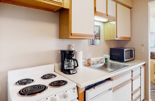 Winter Park Apartment | Simple & Lovely Studio with Wood Fireplace, WiFi & Mountain View Balcony