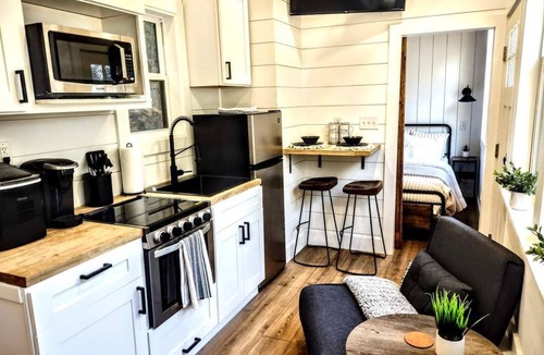 Ashley Oaks House | Simple meets modern in this farmhouse style tiny home!