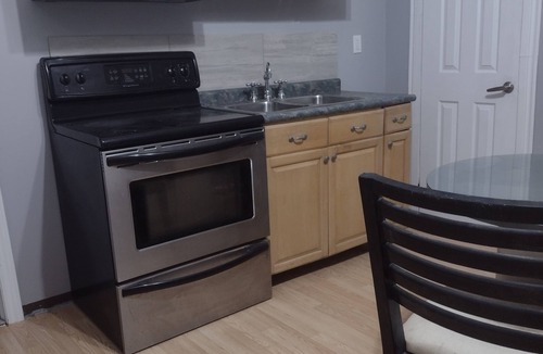 Ruthven Apartment | Simple Suite | 42nd Parallel | Point Pelee Biking