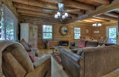Eagle Mountain Cabin | Simpler Times is a real log cabin with kids game room and firepit.