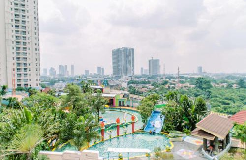 Panunggangan Utara Apartment | Simply and Cozy Pool View 2BR at Great Western Apartment By Travelio