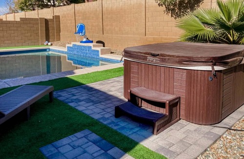 Canyon Trails West House | Single-story home with enclosed yard, private pool, hot tub, patio, & grill