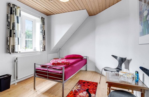 Henne Apartment | Situated right next to the train station, this vacation home near Henne St. awaits you.