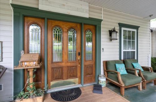 Osage Beach House | Six Suites with Hot Tubs, Private Jacuzzi Baths, Wooded Garden and Lake Access with Boat Slip