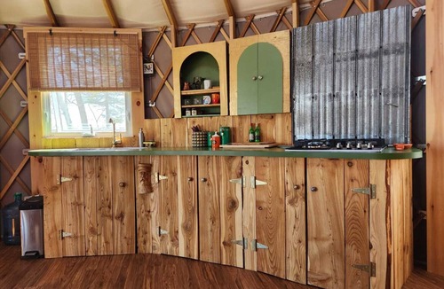 Boularderie RV Rental | Sky high yurt with amazing view of the river