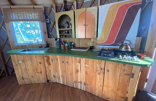 Boularderie RV Rental | Sky high yurt with amazing view of the river