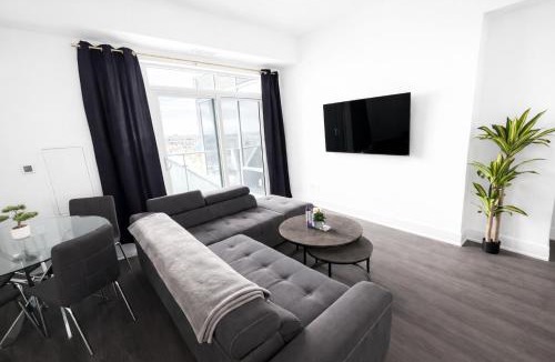 Kitchener Apartment | Skyline Luxury Suite Floor to Ceiling Views King Bed Balcony