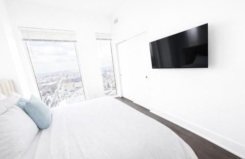 Kitchener Apartment | Skyline Luxury Suite Floor to Ceiling Views King Bed Balcony