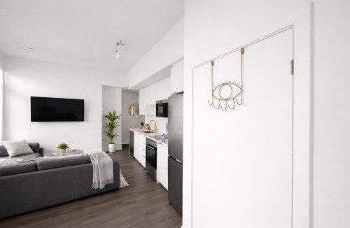 Kitchener Apartment | Skyline Luxury Suite Floor to Ceiling Views King Bed Balcony