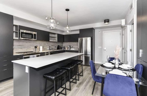 Crystal City Apartment | Sleek 2BR Residence with Gym, Parking & Rooftop Deck