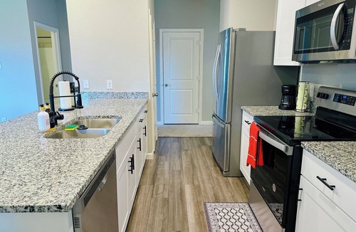 Crowley House | Sleek and Modern home. Perfect for extended stay. Pets friendly