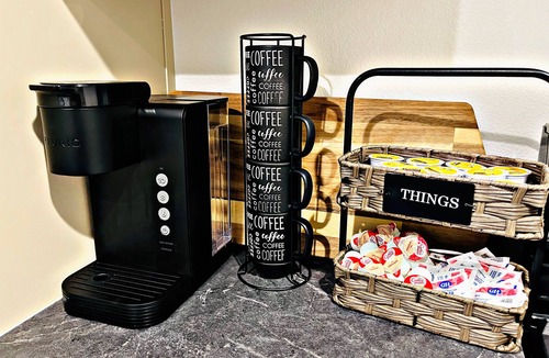 Carmichael House | Sleek+Serene ADU - Modern Kitchen Outdoor Vibes