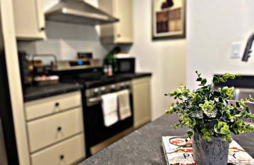 Carmichael House | Sleek+Serene ADU - Modern Kitchen Outdoor Vibes