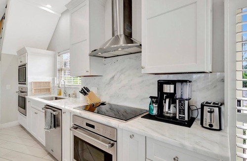 Palm Harbor House | Sleep 16 Waterfront! Hot Tub, Pool & Private Dock!