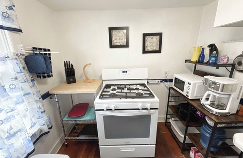 Idlewild Cabin | Sleep 6, Lakeview Cottage with private beach, boat dock & spectacular views.