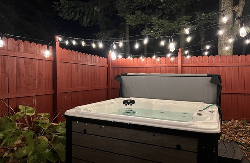 Kewadin House | Sleeps 18, Firepit, Hot Tub and Game Room near Torch Lake