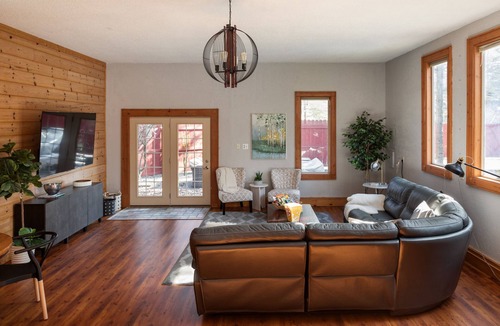 Kewadin House | Sleeps 18, Firepit, Hot Tub and Game Room near Torch Lake