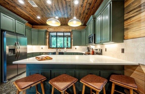 Pickens Cabin | Sleeps 18 people with a private heated pool, hot tub, playground, fire pit, and a private arcade!