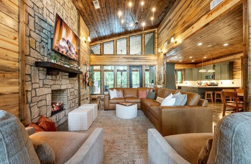Pickens Cabin | Sleeps 18 people with a private heated pool, hot tub, playground, fire pit, and a private arcade!