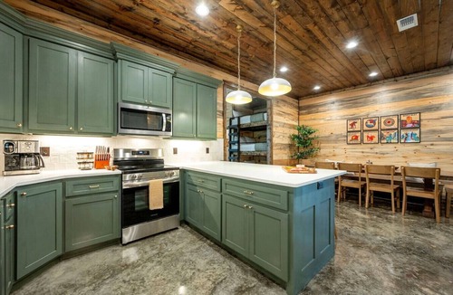 Pickens Cabin | Sleeps 18 people with a private heated pool, hot tub, playground, fire pit, and a private arcade!