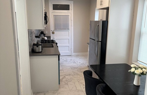 Irving Park East Apartment | Sleeps 4 Stylish Stay with Workspace