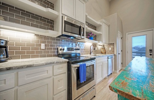 Flour Bluff House | Sleeps 54, 4 Bayfront Homes | Boat Dock, Waterfront Pool, Views | Laguna Village