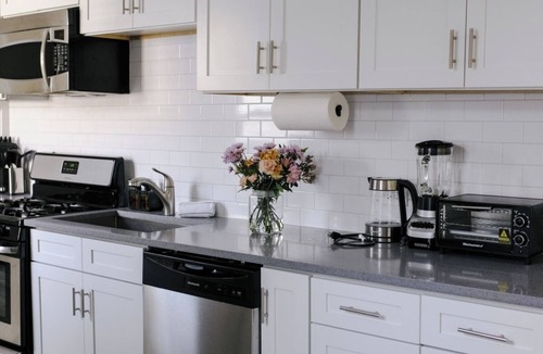 Irving Park East Apartment | Sleeps 7 Huge Projector Designated Workspace