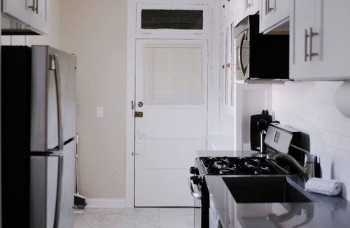 Irving Park East Apartment | Sleeps 7 Huge Projector Designated Workspace