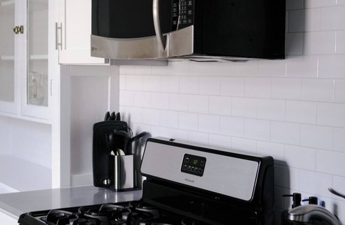 Irving Park East Apartment | Sleeps 7 Huge Projector Designated Workspace