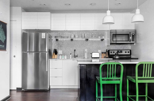 Sobro Cottage | Sleeps 8 4 Sobro Suites w/Kitchens & Modern Touches by Avantstay