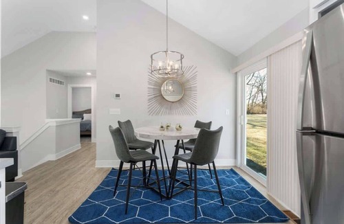 Claycomo House | Sleeps 8 Near Arrowhead 4BR Pets Ok