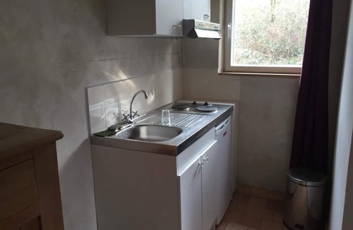 Chammes House | Small stone house near a pond