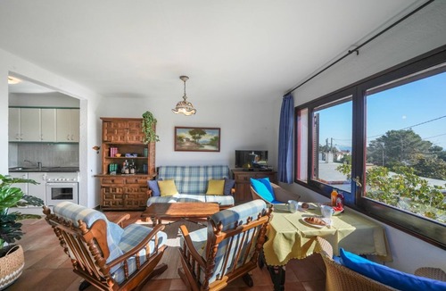 Canyelles House | Small house with sea views, terrace, barbecue, communal pool and air conditioning.