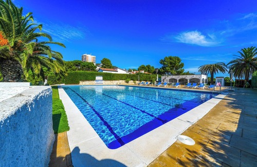 Canyelles House | Small house with sea views, terrace, barbecue, communal pool and air conditioning.