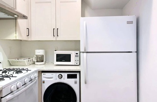 East Flushing House | Smart Home with Skylight! 1500 sqft Deck!