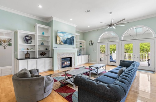 Gulf Breeze House | Snowbird-friendly waterfront home with private pool, elevator, boat dock, grill