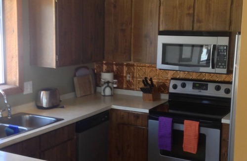 West Yellowstone Condo | Snowmobile trailer parking. Quiet, secure, in town