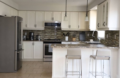 Alcona House | Soléra — A Light-Filled Minimalist Escape Near Beaches & Golf