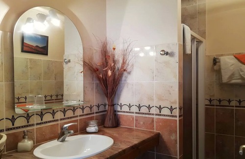 Nauviale Bed & Breakfast | Soleil Levant Guest Room with Shared Pool, Communal Garden, and Wi-Fi