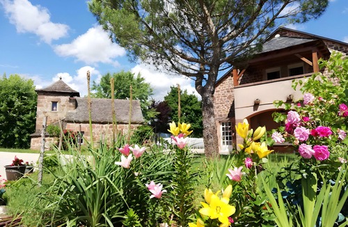 Nauviale Bed & Breakfast | Soleil Levant Guest Room with Shared Pool, Communal Garden, and Wi-Fi