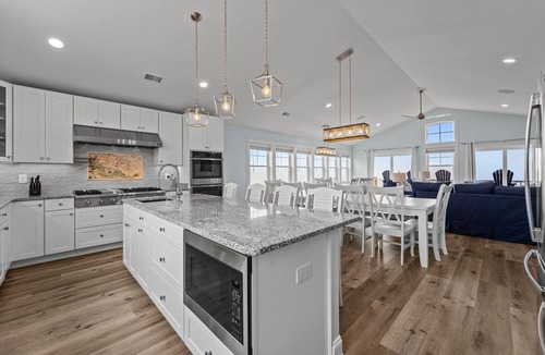 Avon House | Soundfront home, private dock, pool, hot tub, theater, kiteboarding haven ★