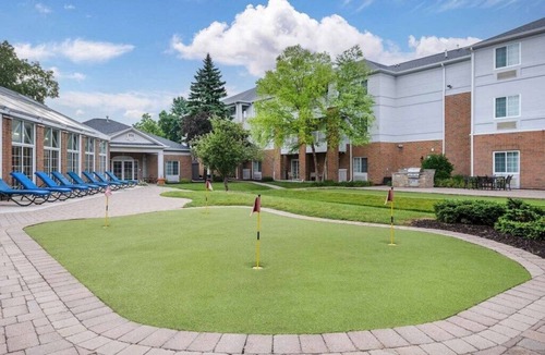 Mishawaka Villa | South Bend | Fan Basecamp | Pool + Hot Tub