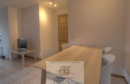 Monteiller Apartment | South facing studio with balcony, 1 double bed, 1 bathroom/WC, sofas, chimney and TV. The closed kit