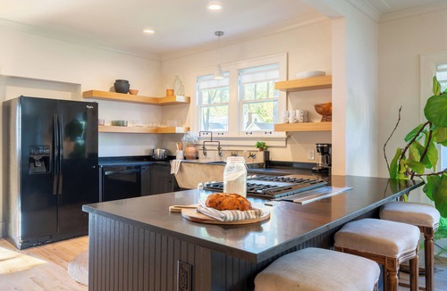 Eastwood House | Southern Charm, Backyard Firepit, Mins to Downtown | Chapel House by AvantStay