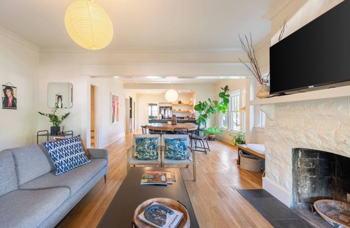 Eastwood House | Southern Charm, Backyard Firepit, Mins to Downtown | Chapel House by AvantStay