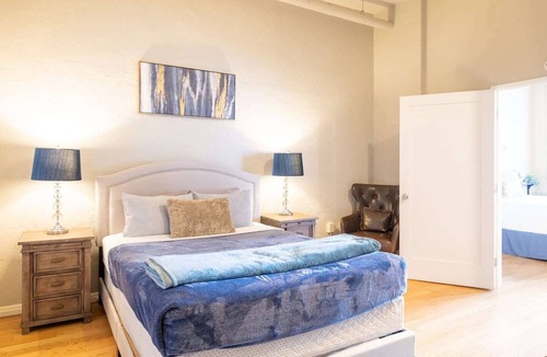 Gaslamp Quarter Hotel | Spacious 1 BR 700 sq ft loft suite with free parking, steps to the Convention Center and Gaslamp dining. Ideal for business or group travel.