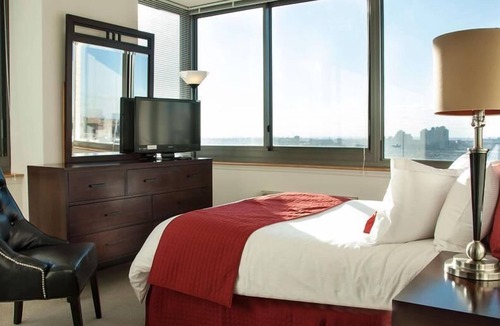 Hudson Exchange Apartment | Spacious 1BR | Gym | steps from PATH | near NYC | by GLS