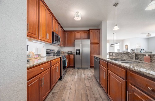 Florida Central Atlantic Coast Condo | Spacious 2,100 Sq Ft Lakeside Corner Condo at Vista Cay Near Top Attractions"