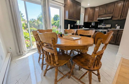 Laval House | Spacious 2BR | FREE Parking + 1.5 Bath | Near YUL